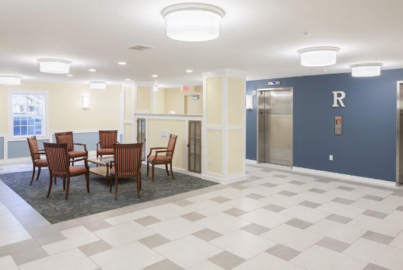 Modern office lobby with professional lighting and AV systems